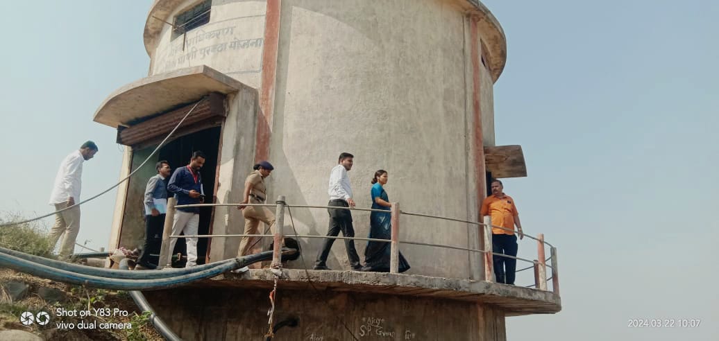 Solapur CEO Manisha Awhale climbs the water tank in Karmala taluk to solve the shortage